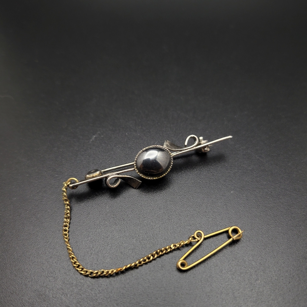 Vintage Modernist Bar Brooch with Hematite Cabochon and Gold Tone Safety Chain